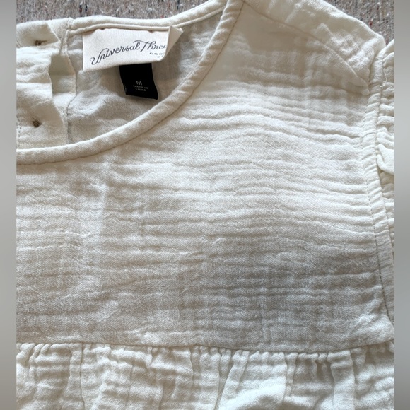 Ivory Ruffle Top - Picture 3 of 3